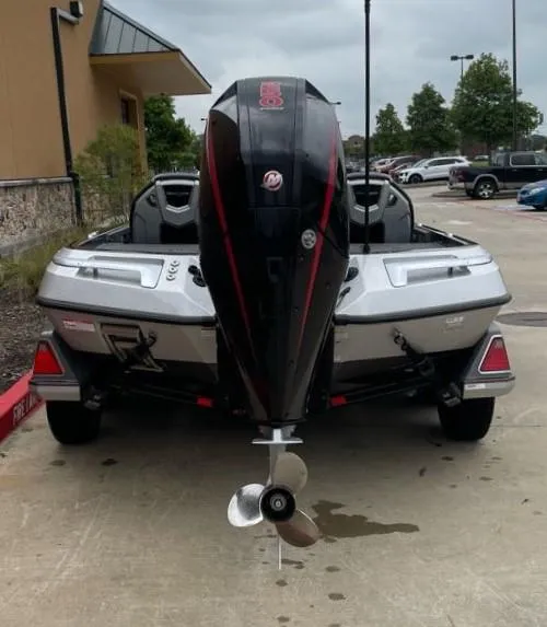 Slide: The Image of 2024 Ranger Z521R Ranger Cup Equipped boat, rear view in parking lot. - 3