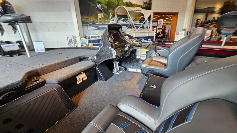 Slide: The Image of 2024 Nitro Z20 Pro boat interior with modern seating and advanced control console. - 4
