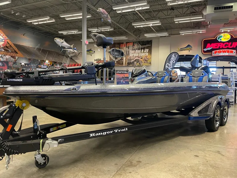 Slide: The Image of 2024 Ranger Z521R Ranger Cup Equipped boat displayed in showroom with trailer. - 1