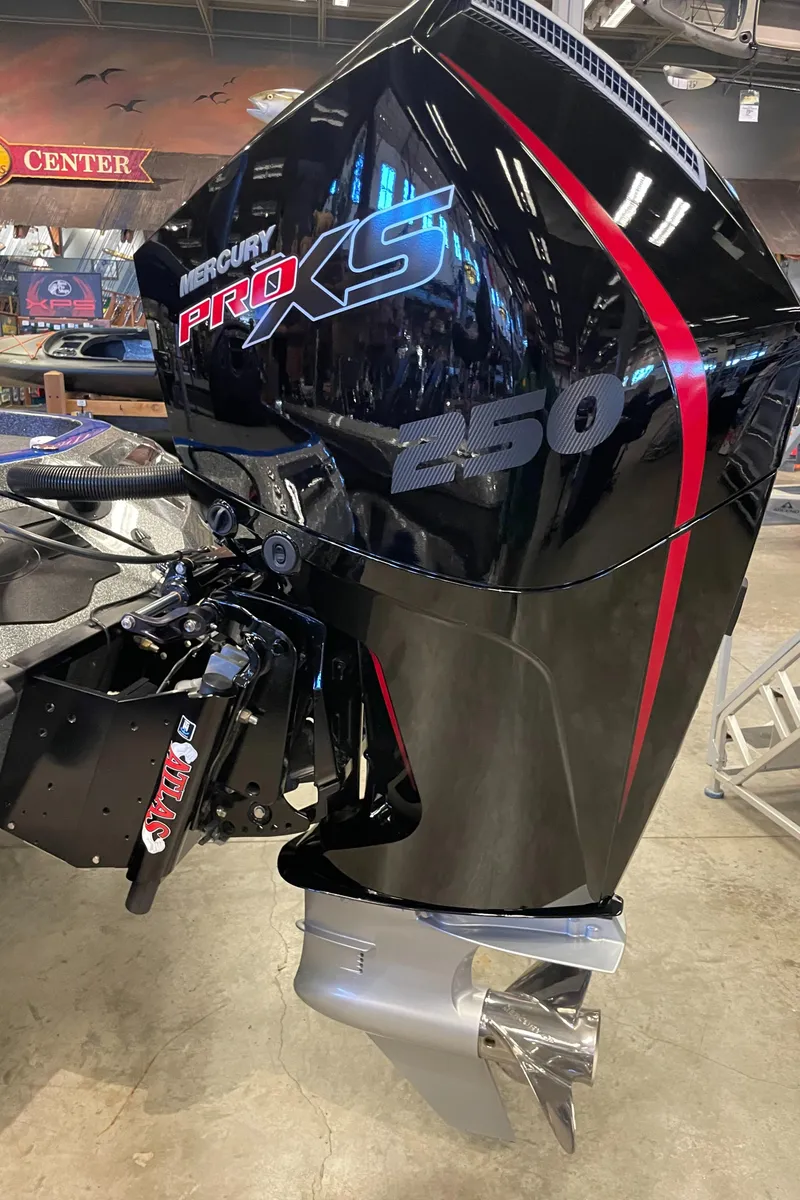 Slide: The Image of 2024 Ranger Z521R boat with Mercury Pro XS 250 engine in showroom. - 4