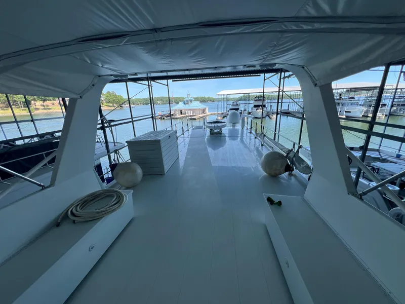 Slide: The Image of 1995 Pluckebaum Coastal Cruiser yacht deck with marina view. - 15