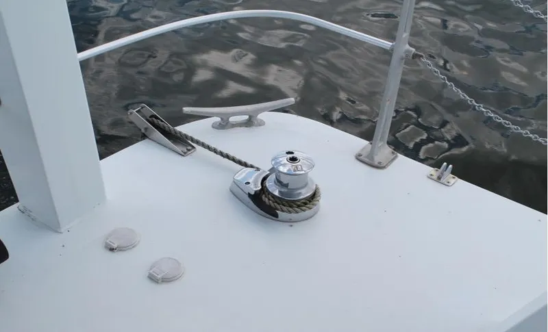 Slide: The Image of Deck of 1995 Pluckebaum Coastal Cruiser with winch and cleat. - 5