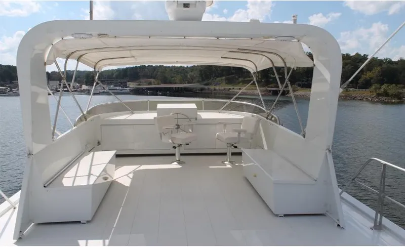 Slide: The Image of 1995 Pluckebaum Coastal Cruiser yacht deck with seating and helm station. - 6