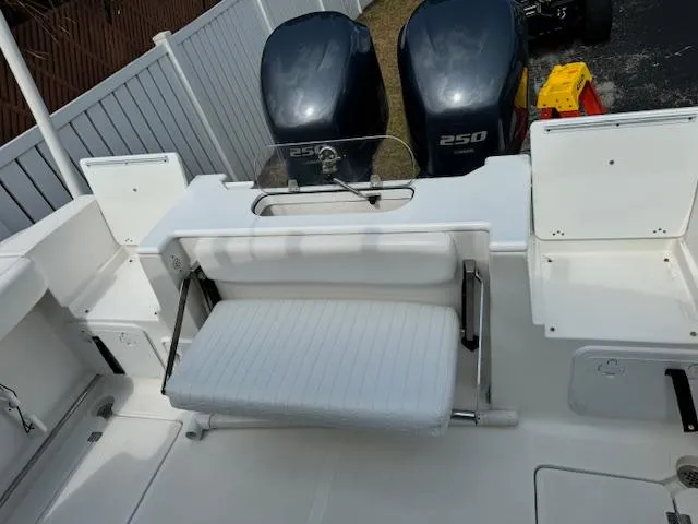 Slide: The Image of 2013 Sea Fox 286 CC boat with dual 250 HP engines and foldable bench seat. - 26