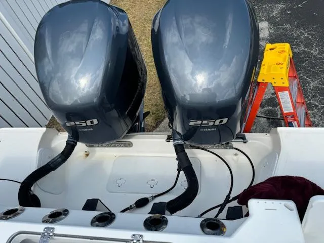 Slide: The Image of Twin Yamaha 250 outboard engines on a 2013 Sea Fox 286 CC boat. - 27