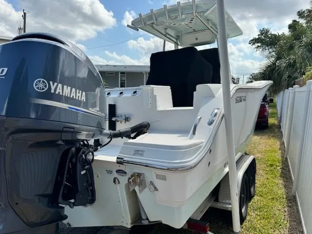 Slide: The Image of 2013 Sea Fox 286 CC boat with Yamaha outboard motor on trailer. - 3