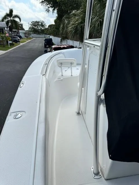 Slide: The Image of 2013 Sea Fox 286 CC boat deck with railing and seating. - 32