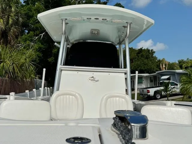 Slide: The Image of 2013 Sea Fox 286 CC center console boat with T-top and seating. - 5