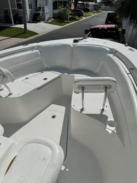 Slide: The Image of 2013 Sea Fox 286 CC boat interior with seating and storage compartments. - 7