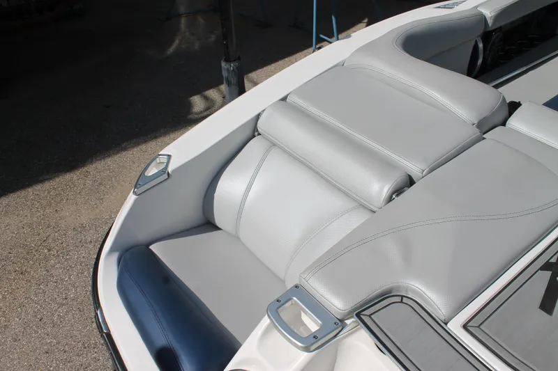 Slide: The Image of 2016 MasterCraft X26 boat with gray leather seating. - 12