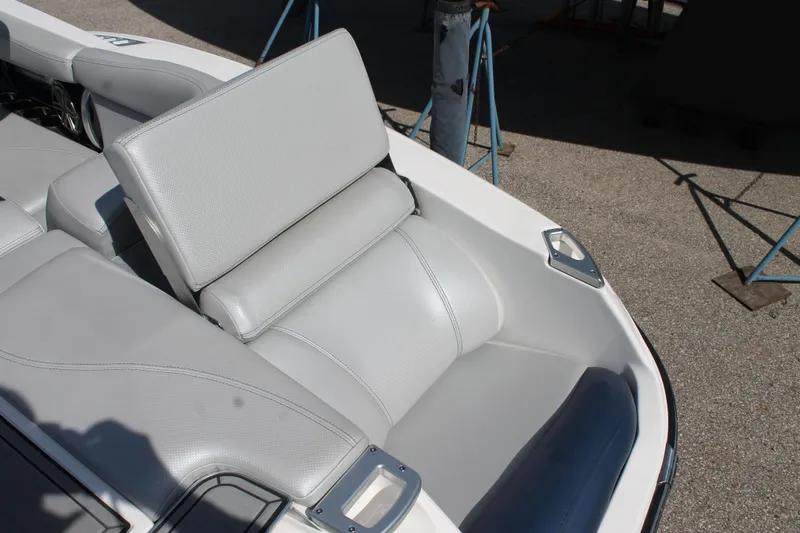 Slide: The Image of 2016 MasterCraft X26 boat with gray leather seating. - 15