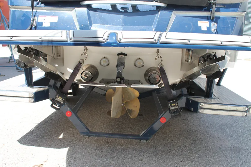 Slide: The Image of 2016 MasterCraft X26 boat stern with propeller and trim tabs. - 42