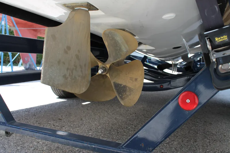 Slide: The Image of 2016 MasterCraft X26 boat propeller and rudder on trailer. - 44