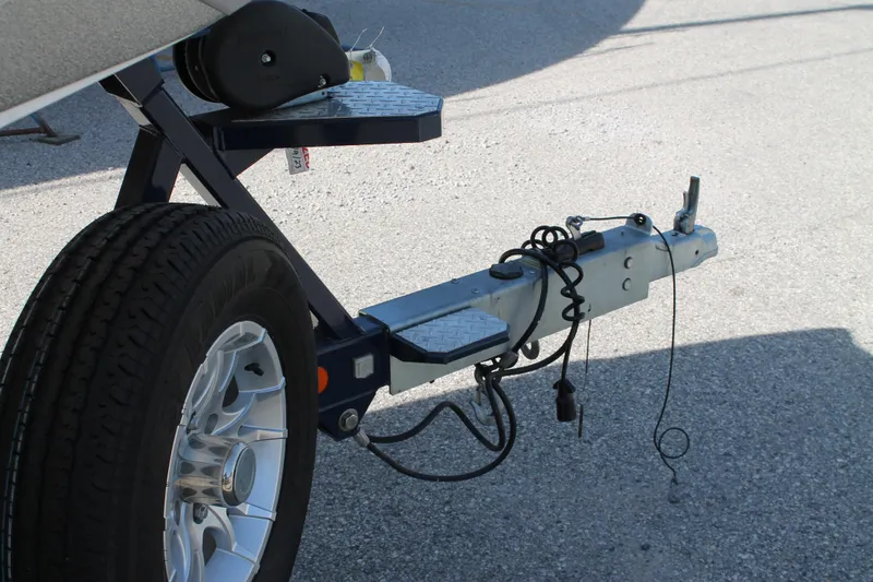 Slide: The Image of 2016 MasterCraft X26 boat trailer hitch and wheel assembly. - 45