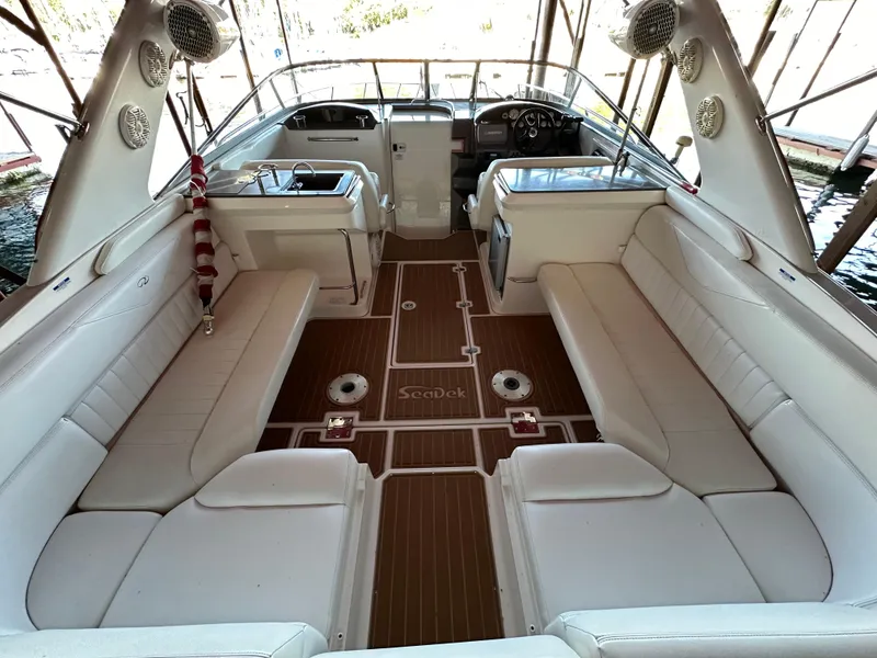 Slide: The Image of 2005 Regal 3350 Sport Cruiser interior with spacious seating and elegant design. - 13