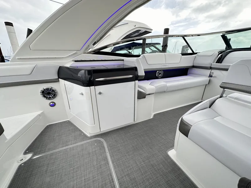 Slide: The Image of 2024 Formula 310 Bowrider I/O interior with luxurious seating and modern design. - 13