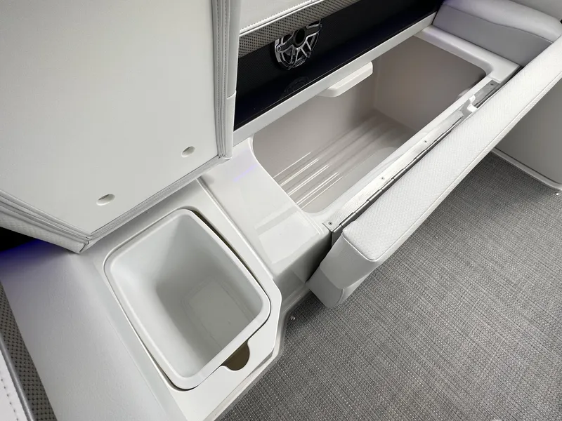 Slide: The Image of 2024 Formula 310 Bowrider I/O interior storage compartments and seating. - 19