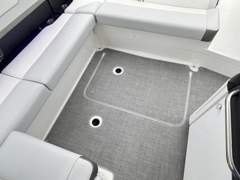 Slide: The Image of 2024 Formula 310 Bowrider I/O interior seating and deck area. - 22