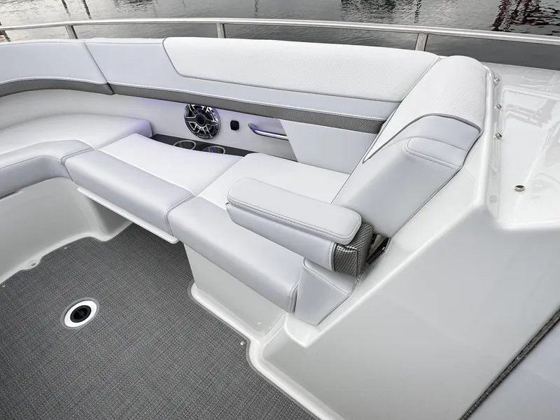 Slide: The Image of 2024 Formula 310 Bowrider I/O interior seating with gray upholstery and modern design. - 48