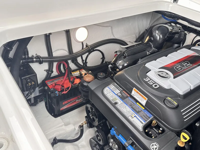 Slide: The Image of Engine compartment of 2024 Formula 310 Bowrider I/O with 6.2L 350 HP engine. - 11