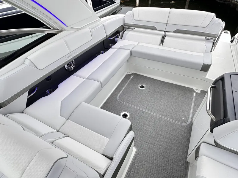 Slide: The Image of 2024 Formula 310 Bowrider I/O interior with spacious seating and modern design. - 21