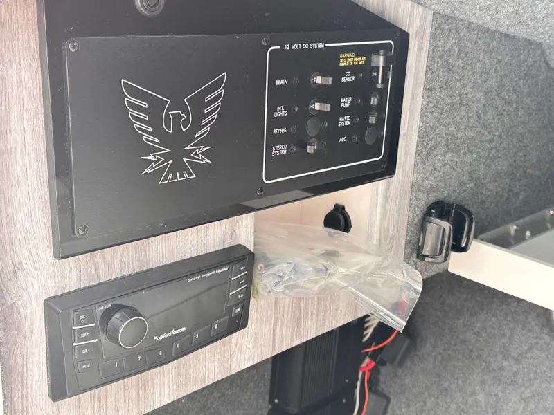 Slide: The Image of Control panel and audio system in 2024 Formula 310 Bowrider I/O boat. - 42