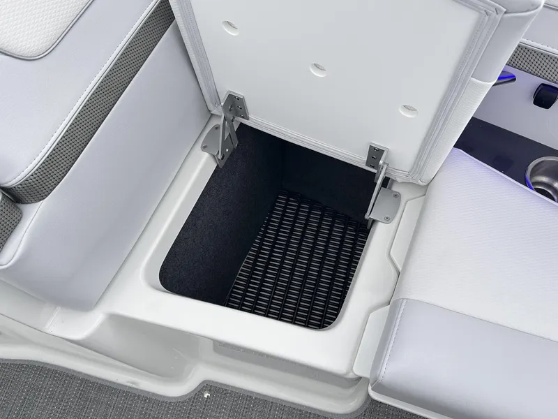 Slide: The Image of 2024 Formula 310 Bowrider I/O under-seat storage compartment. - 47