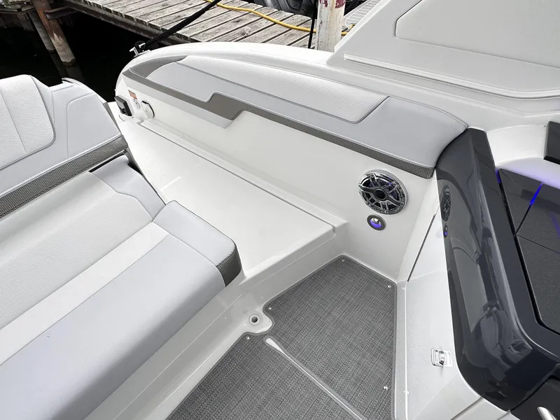 Slide: The Image of 2024 Formula 310 Bowrider I/O interior seating and speaker detail. - 8
