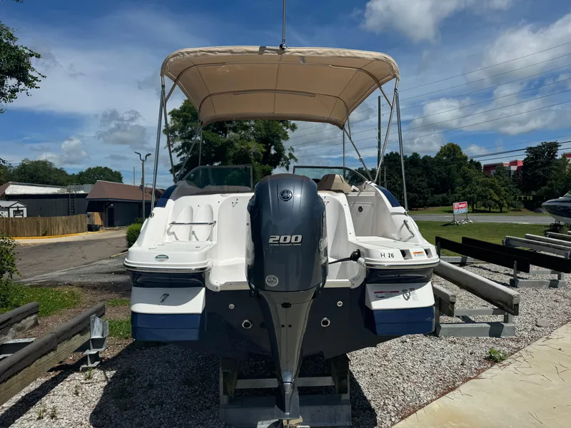Slide: The Image of 2023 Hurricane SunDeck 2200 DC OB boat with Yamaha 200 outboard motor. - 1