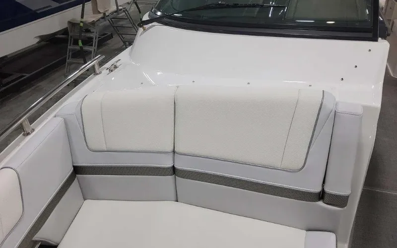 Slide: The Image of 2025 Formula 330 Crossover Bowrider I/O, featuring sleek white seating and modern design. - 25