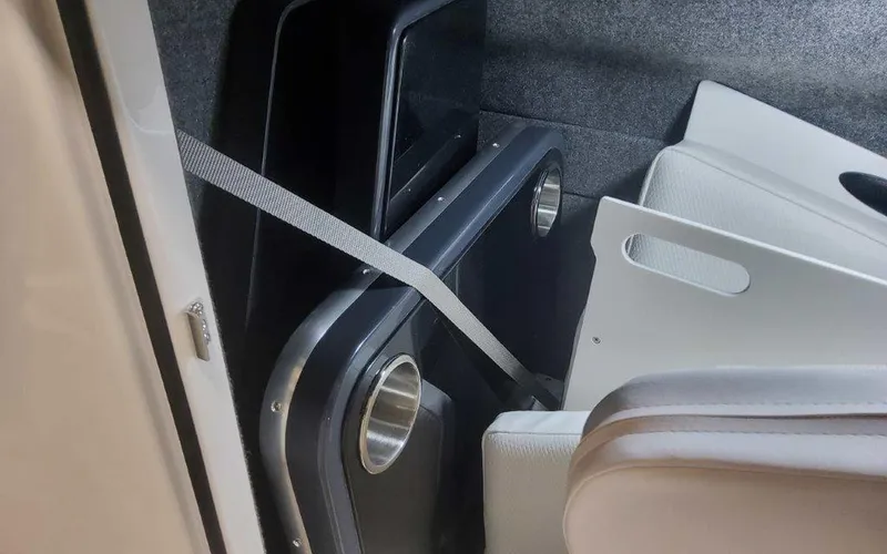 Slide: The Image of Interior of 2025 Formula 330 Crossover Bowrider I/O with cup holders and seating. - 36