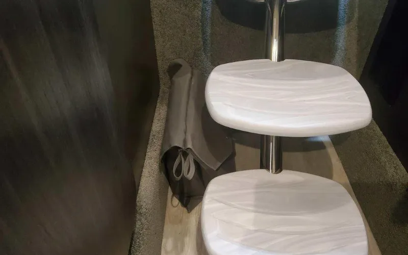 Slide: The Image of Interior steps of 2025 Formula 330 Crossover Bowrider I/O boat, featuring sleek design. - 16