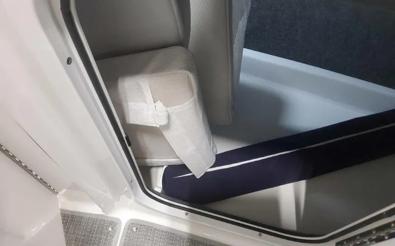 Slide: The Image of 2025 Formula 330 Crossover Bowrider I/O interior detail with seating and flooring. - 35