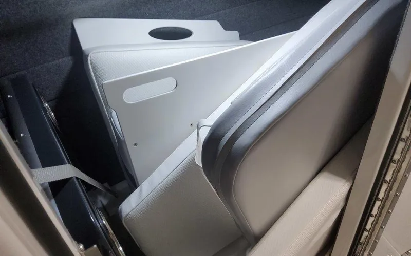 Slide: The Image of 2025 Formula 330 Crossover Bowrider I/O interior seating and storage area. - 37