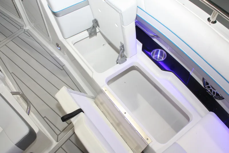 Slide: The Image of 2027 Formula 330 Crossover Bowrider I/O interior storage compartments and seating area. - 47