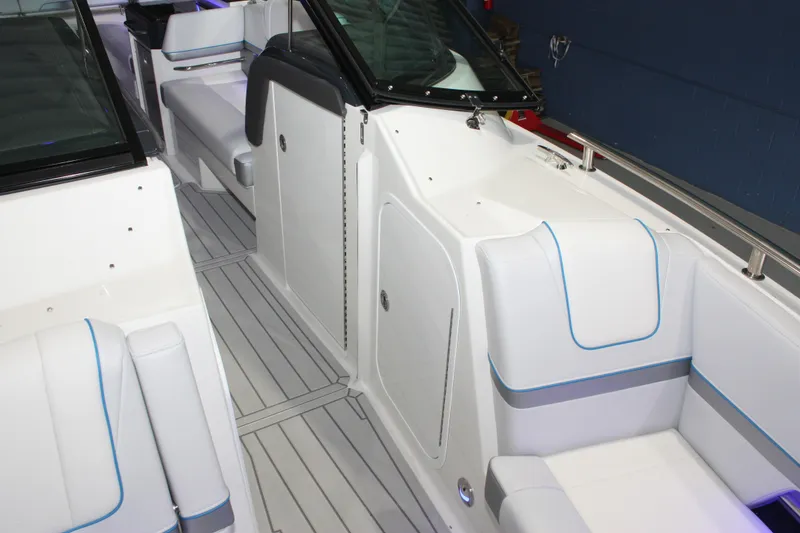 Slide: The Image of 2027 Formula 330 Crossover Bowrider I/O interior with sleek white seating and modern design. - 46