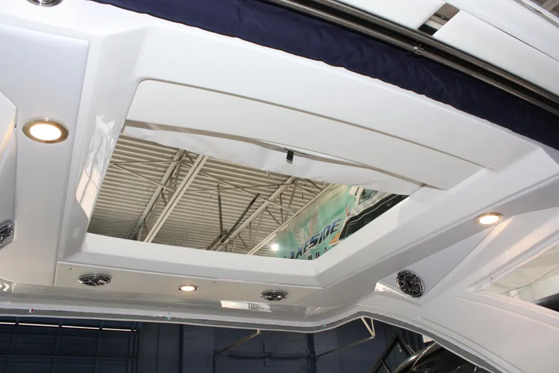 Slide: The Image of Interior view of 2027 Formula 330 Crossover Bowrider I/O boat with modern lighting. - 58