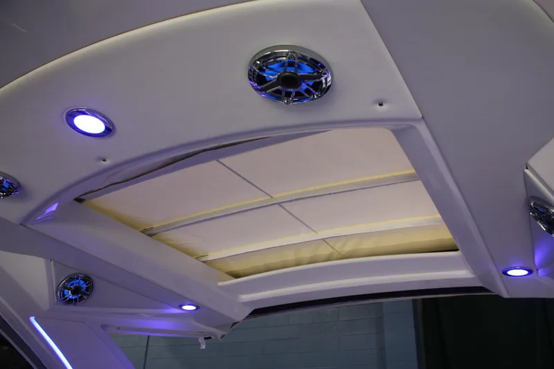 Slide: The Image of Interior view of 2027 Formula 330 Crossover Bowrider I/O boat ceiling with LED lights. - 59