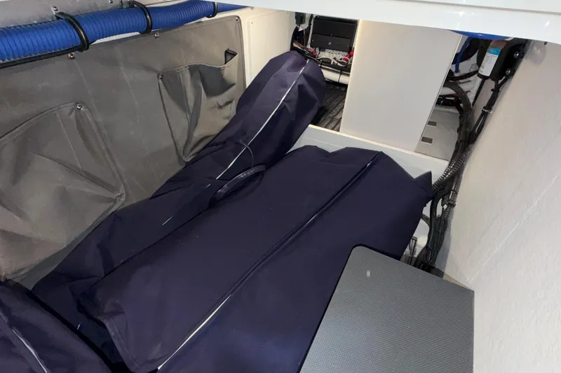Slide: The Image of Interior storage area of 2027 Formula 330 Crossover Bowrider I/O boat. - 29