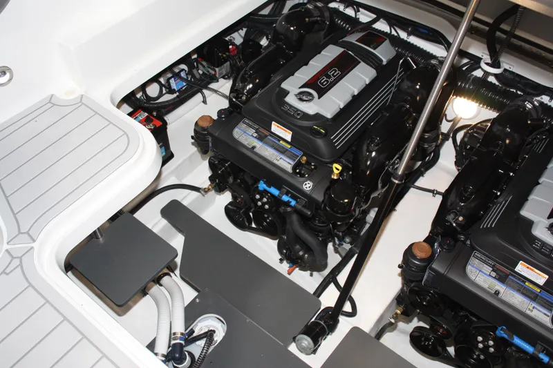 Slide: The Image of Engine compartment of 2027 Formula 330 Crossover Bowrider I/O, showcasing dual 6.2L engines. - 63