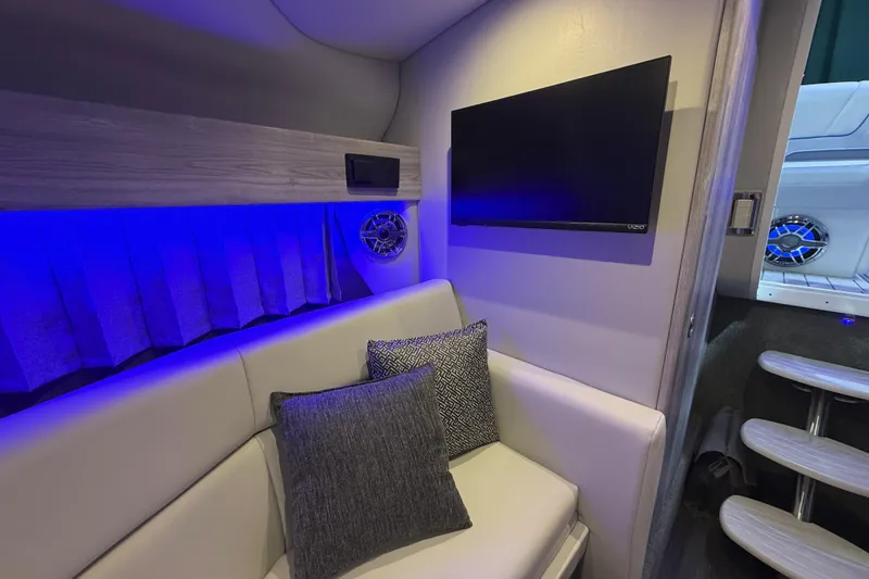 Slide: The Image of Interior of 2027 Formula 330 Crossover Bowrider I/O with modern seating and ambient lighting. - 33