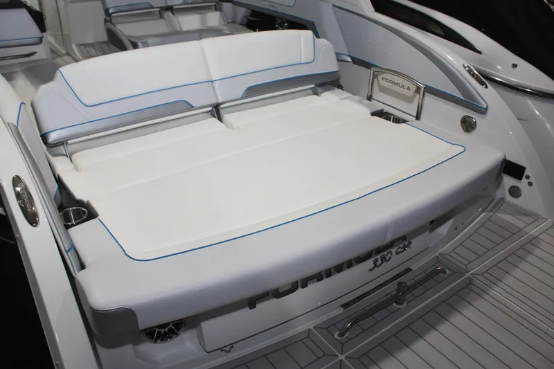Slide: The Image of 2027 Formula 330 Crossover Bowrider I/O with luxurious seating and sleek design. - 11