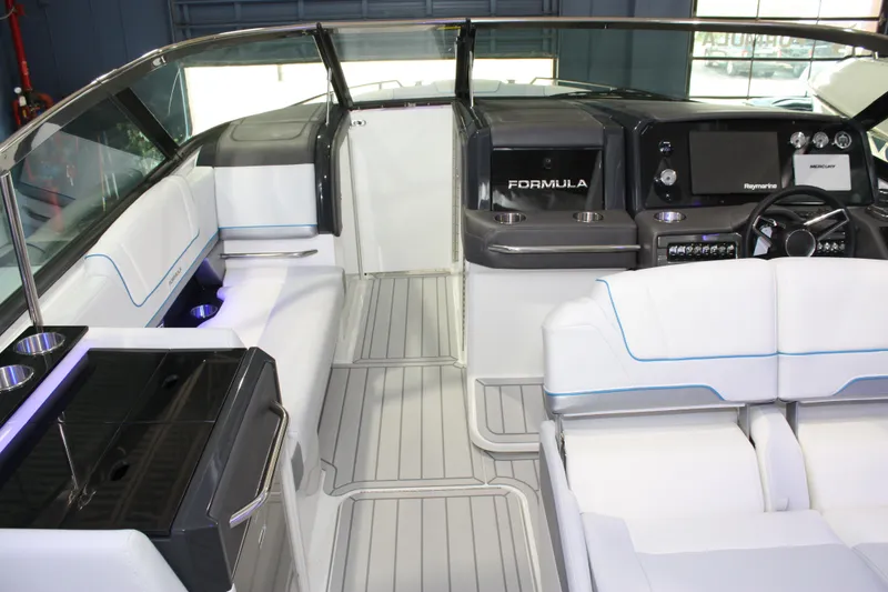 Slide: The Image of 2027 Formula 330 Crossover Bowrider I/O interior with sleek design and modern dashboard. - 60