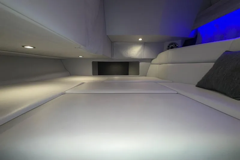 Slide: The Image of Luxurious interior cabin of 2027 Formula 330 Crossover Bowrider I/O with ambient lighting. - 36