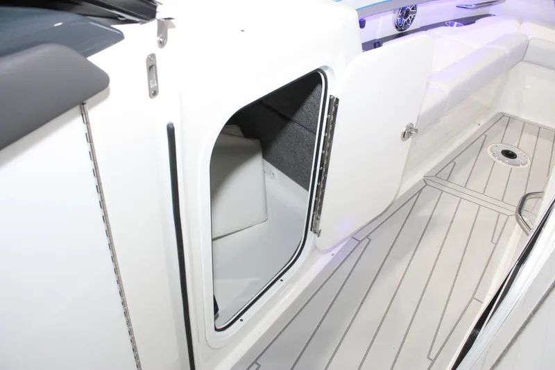 Slide: The Image of 2027 Formula 330 Crossover Bowrider I/O interior storage compartment with sleek design. - 51