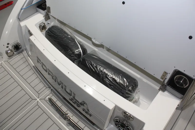 Slide: The Image of Storage compartment of 2027 Formula 330 Crossover Bowrider I/O boat, featuring sleek design. - 13