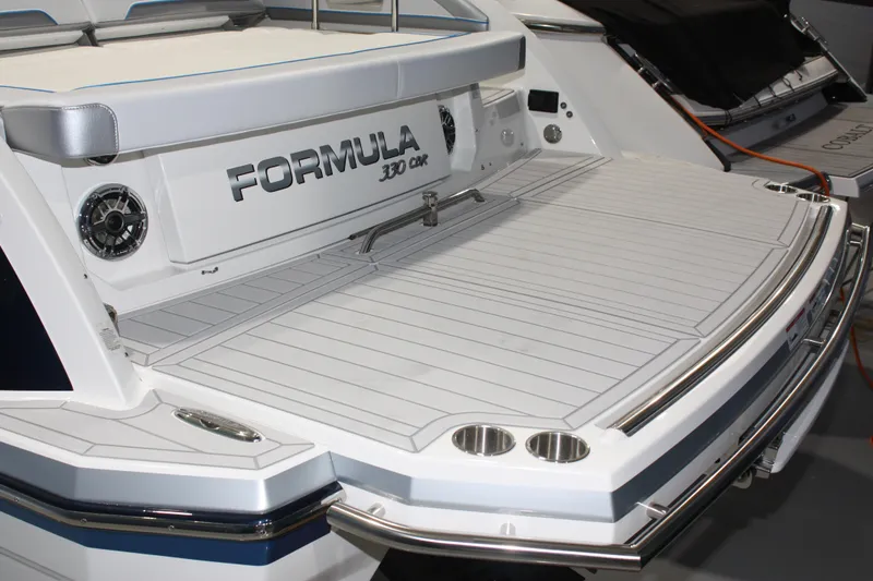 Slide: The Image of 2027 Formula 330 Crossover Bowrider I/O boat with spacious swim platform. - 8
