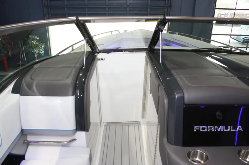 Slide: The Image of 2027 Formula 330 Crossover Bowrider I/O interior with sleek seating and modern design. - 52