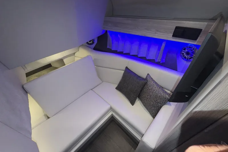 Slide: The Image of Luxurious interior of 2027 Formula 330 Crossover Bowrider I/O with modern seating and ambient lighting. - 39