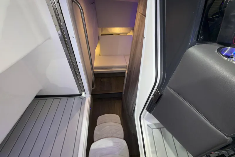 Slide: The Image of Interior view of 2027 Formula 330 Crossover Bowrider I/O, featuring sleek seating and modern design. - 43